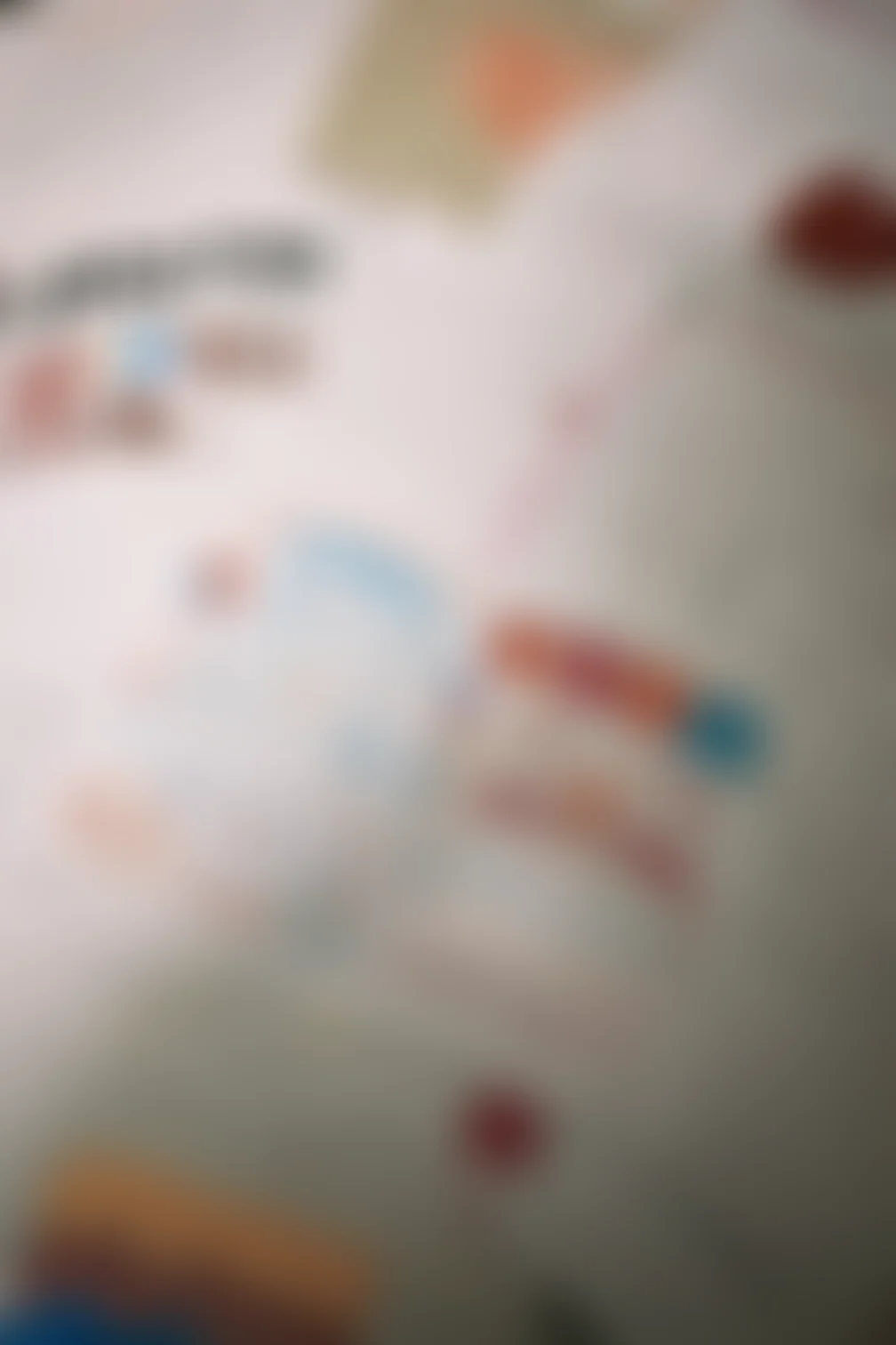 Handwritten correspondence, blurred for privacy